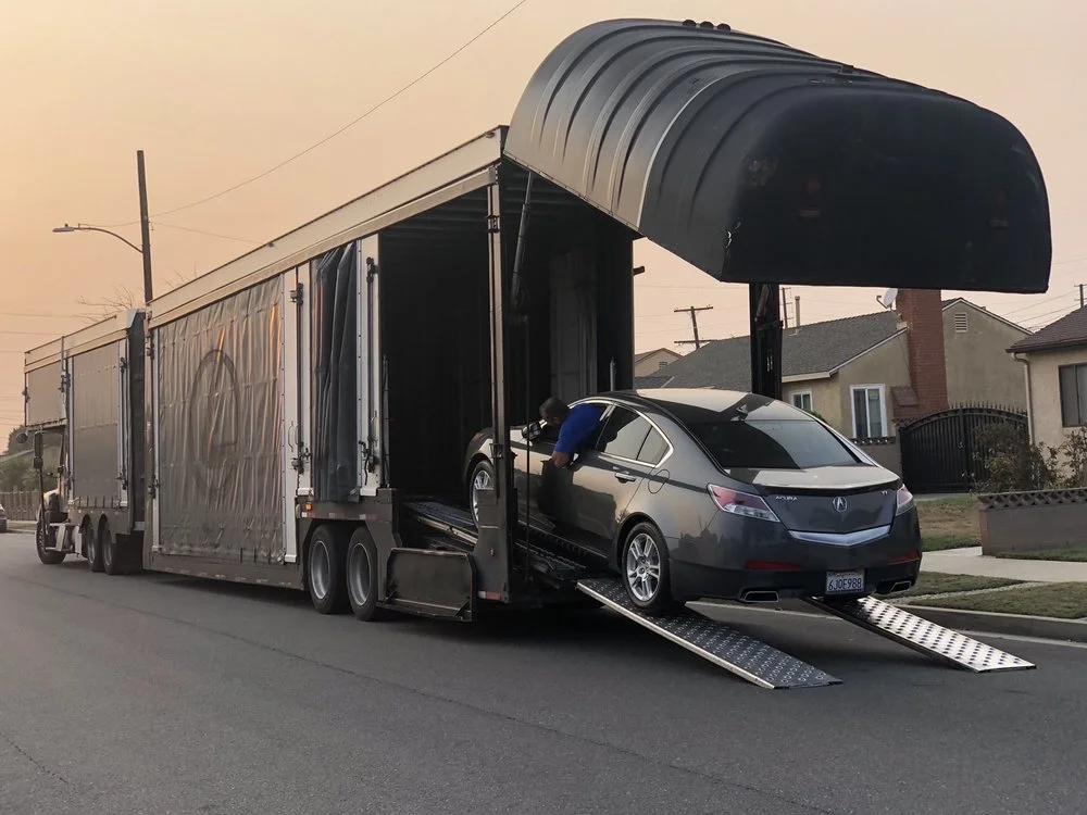 enclosed car transport vehicle been pick up